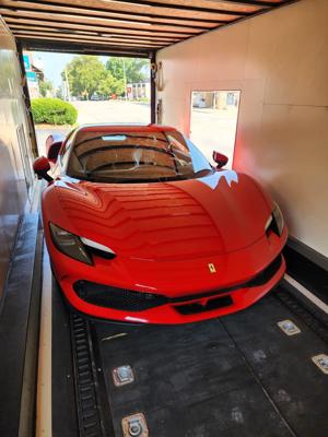 Ferrari in enclosed auto transport trailer