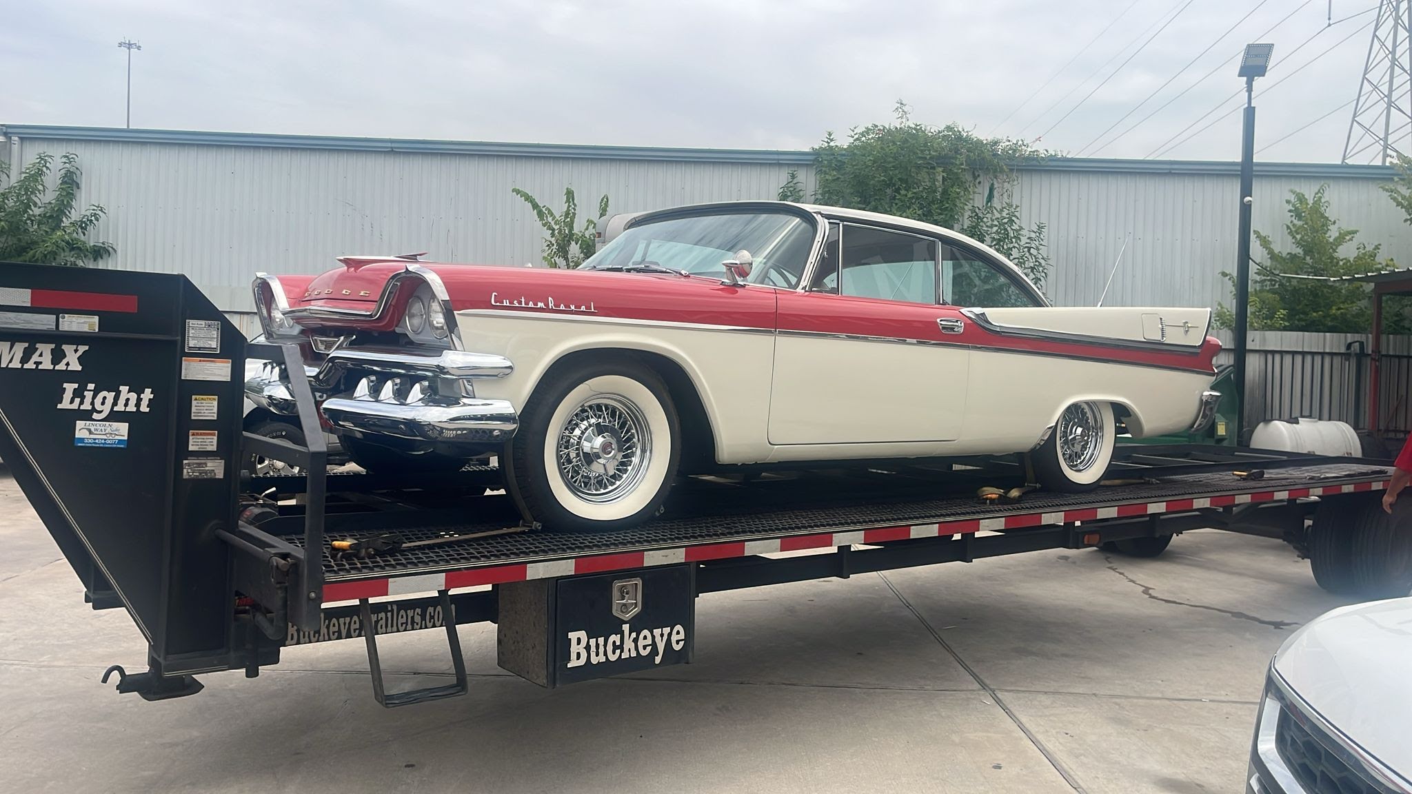 Classic Dodge Custom Royal on flatbed transport