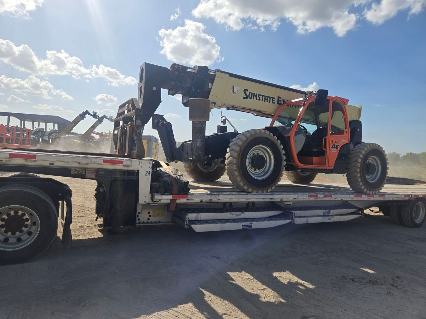 Telehandler on a step deck trailer