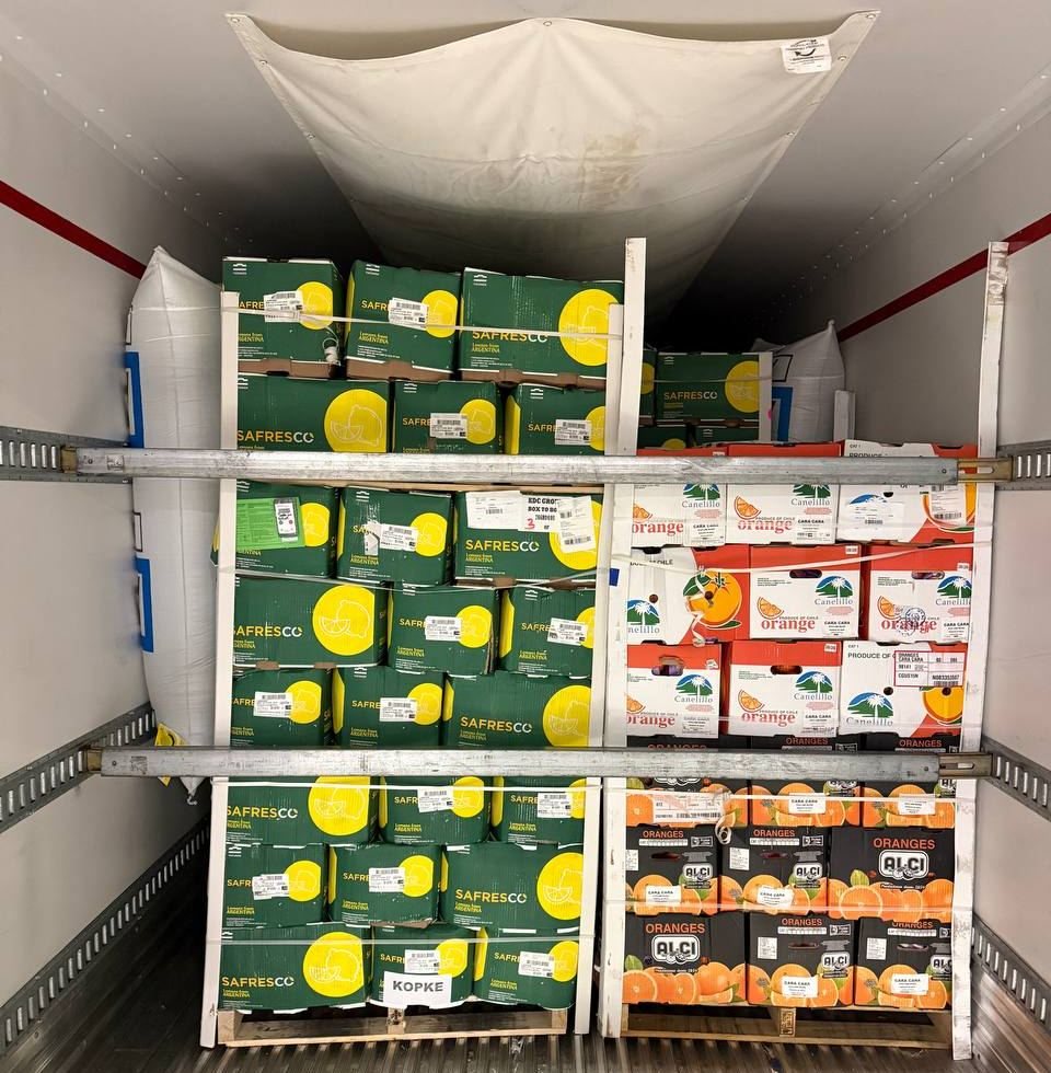 Imported citrus pallets braced in a reefer trailer