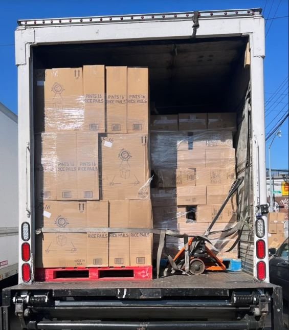 Box truck with liftgate delivering in Brooklyn